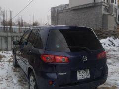 Photo of the vehicle Mazda Demio