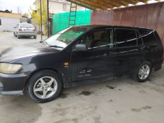 Фото авто Mitsubishi Lancer