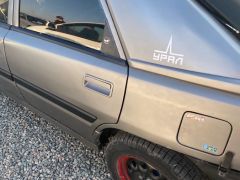 Сүрөт унаа Mazda 323