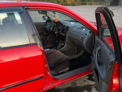 Photo of the vehicle Mazda 323