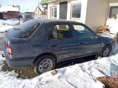 Photo of the vehicle Nissan Sunny