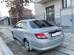 Photo of the vehicle Honda Fit Aria