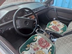 Сүрөт унаа Mercedes-Benz W124