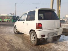 Photo of the vehicle Daihatsu Cuore