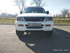 Сүрөт унаа Mitsubishi Montero Sport