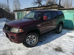 Сүрөт унаа Mitsubishi Montero Sport