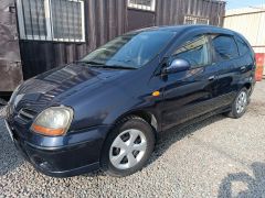 Photo of the vehicle Nissan Almera Tino