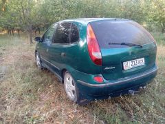 Photo of the vehicle Nissan Almera Tino