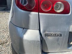 Фото авто Mazda Demio