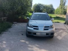 Сүрөт унаа Mitsubishi Outlander