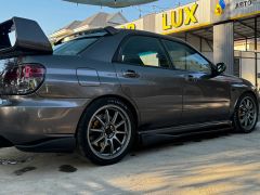 Photo of the vehicle Subaru Impreza WRX STi