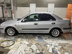 Photo of the vehicle Nissan Almera