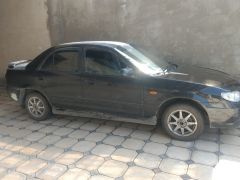 Photo of the vehicle Mazda 323