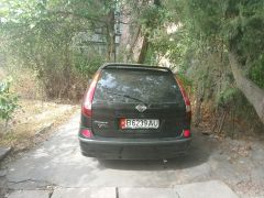 Фото авто Nissan Almera Tino