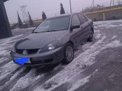 Фото авто Mitsubishi Lancer