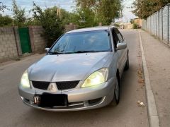 Фото авто Mitsubishi Lancer