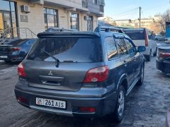 Сүрөт унаа Mitsubishi Outlander