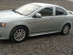 Фото авто Mitsubishi Lancer