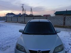 Фото авто Mazda Demio