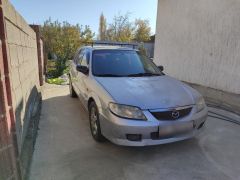 Фото авто Mazda 323