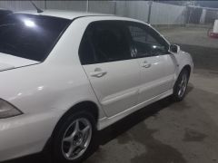 Photo of the vehicle Mitsubishi Lancer