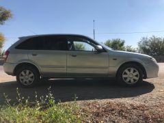 Сүрөт унаа Mazda 323