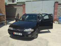 Фото авто Nissan Primera