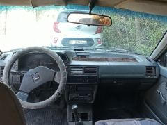 Photo of the vehicle Mazda 323