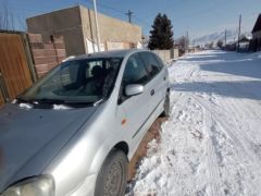 Photo of the vehicle Nissan Almera Tino