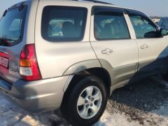 Сүрөт унаа Mazda Tribute