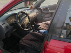 Photo of the vehicle Mazda 323