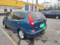 Фото авто Nissan Almera Tino