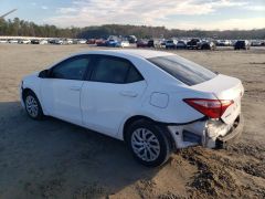 Photo of the vehicle Toyota Corolla