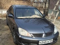 Фото авто Mitsubishi Lancer