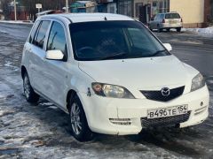 Photo of the vehicle Mazda Demio