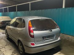 Photo of the vehicle Nissan Almera Tino