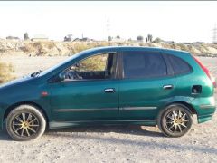 Сүрөт унаа Nissan Almera Tino