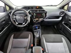 Фото авто Toyota Prius c