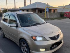 Сүрөт унаа Mazda Demio