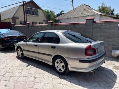 Сүрөт унаа Mitsubishi Carisma