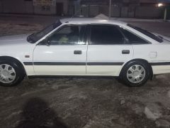 Фото авто Mazda 626