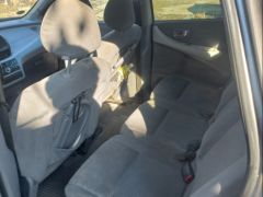 Фото авто Nissan Almera Tino