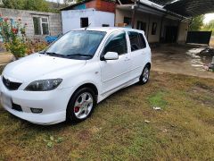 Сүрөт унаа Mazda Demio