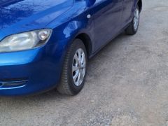 Сүрөт унаа Mazda Demio