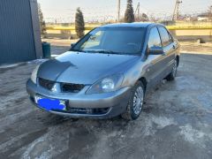 Photo of the vehicle Mitsubishi Lancer