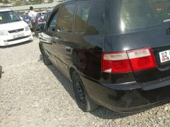 Photo of the vehicle Kia Carens