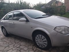 Фото авто Nissan Primera