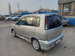 Сүрөт унаа Nissan Cube