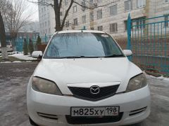 Фото авто Mazda Demio