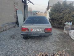 Сүрөт унаа Mazda 323